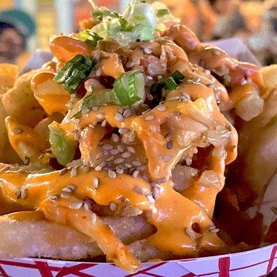 Kimchi Fries. Fries topped with kimchi, scallions, hot sauce, and more $8 + tax + tip