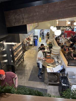 Pizza elves hard at work.