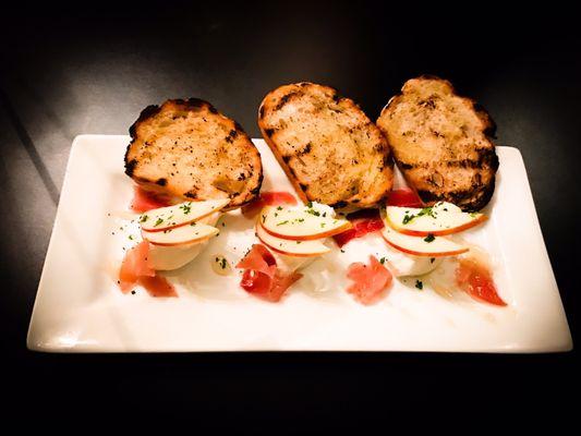Homemade ricotta, apple, honey, pancetta, and crostini (small dish). Awesome!