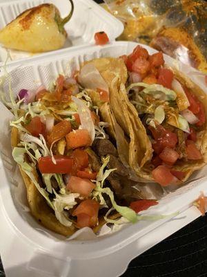 2 tacos de asada Baja style tacos come with cabbage, pico de gallo, & salsa. (Crema on the side) Delicious!