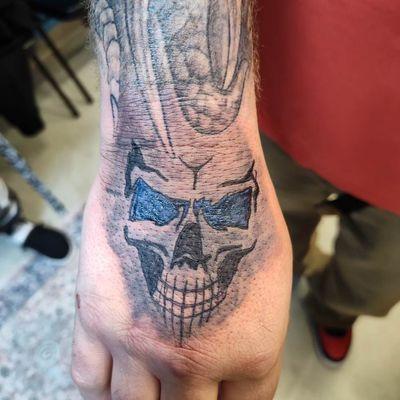 Hand tattoo by Sam