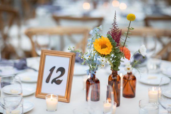 We were able to supply our own bud vases for the centerpieces