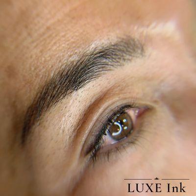 Microbladed eyebrows and eeliner tattoo