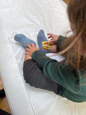 Even when not feeling well he's still excited to get stickers from his favorite doctor. We love Dr Geisler