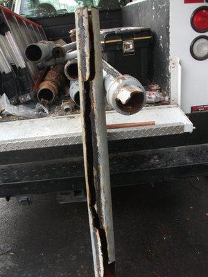 The large fissure in one of the drain pipes that was letting raw sewage run down the side of our building. Repaired by Gotelli.