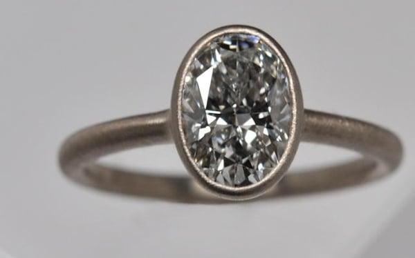 CONTEMPORARY BEZEL SETTING, OVAL-SHAPE. BUYING DIAMONDS. INHERIT A DIAMOND? SELL IT! BUYING ESTATE JEWELRY. DIVORCED---SELL THAT DIAMOND!