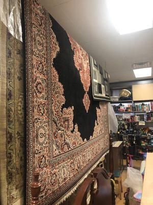 $900 rug that owner states worth over $10,000.