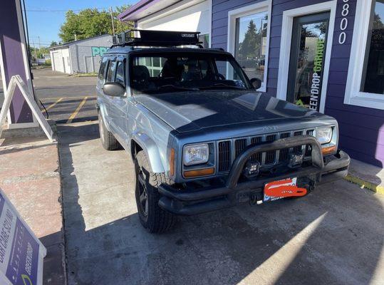 Photo of my car in front of the shop