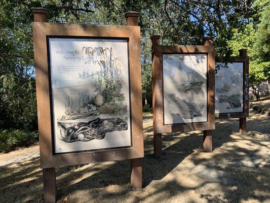 Welcome signs, including information about the watershed.