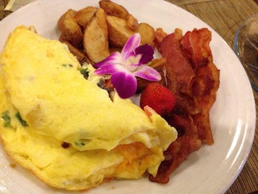 Sausage and cheese omelet with peppers I didn't order