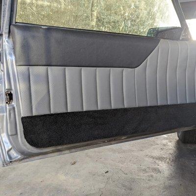 1984 Ford Mustang Fox body Door panel reupholstered: Black & Grey perforated leather with Black Carpet Inserts