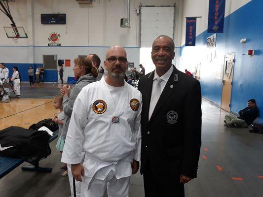 One of our students with Grand Master Clinton Robinson.