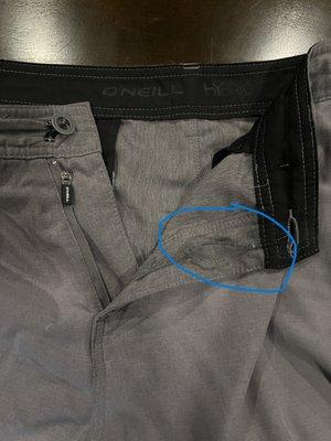 Another third pair of shorts where the zipper mechanism came undone and lost.