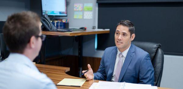 A probate attorney consults with a client