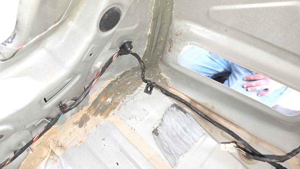 inside trunk with whatever sealant they used