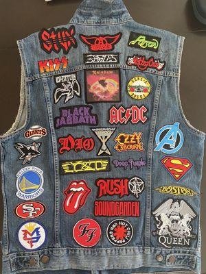 Patches sewn on back of vest