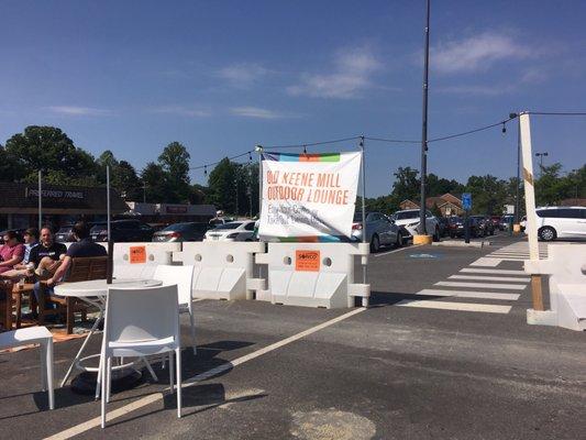 Yep. It's a lounge in a parking lot with construction barrier walls. Bring your own everything. They provide the seating - and ambience!