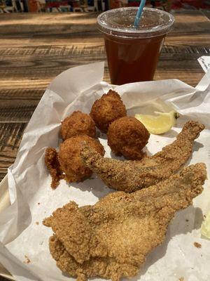 Catfish and hush puppies with ice tea