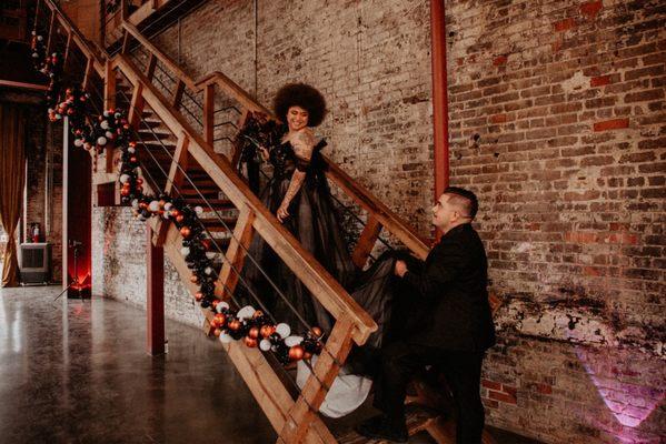 I wanted the stairs to have these Halloween garlands on them and Lily set them up perfectly!