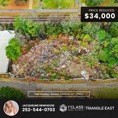 Jacqueline Newhouse - 1st Class Real Estate