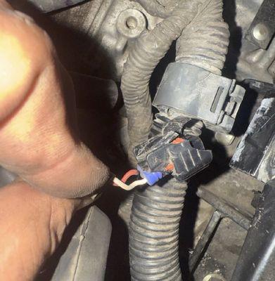 P0793 - damaged connector/pigtail at the front wheel speed sensor, resulting in intermittent or lost signal.