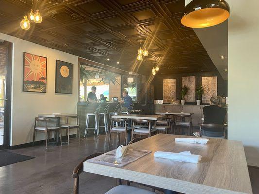 Ambience -- and air conditioning! Although the patio is lovely and has fans.