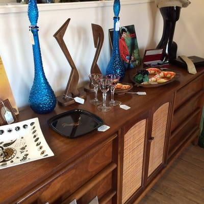 A variety of mid-century modern home decor and kitchenware.