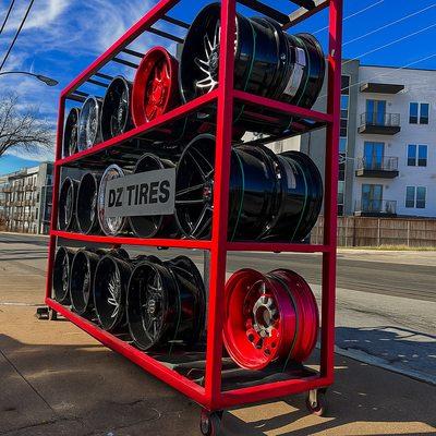 Street‑Side Selection: Fresh arrivals of wheels ready for installation--come pick yours today at DZTIRES. #WheelRack #FreshStock
