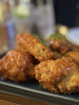 Buffalo wings very good and very fried.