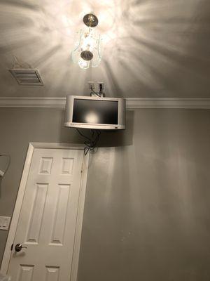 TV wires hanging off and works sometimes