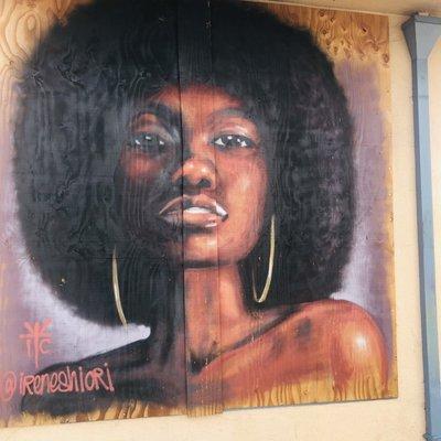 Beautiful woman wearing an Afro.