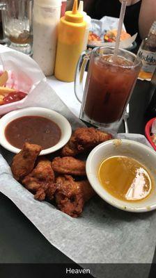 Wings with garlic parm sauce and kickin Caribbean amazing so delicious