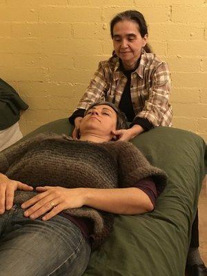 Sylvia with a client - treatment happens fully clothed