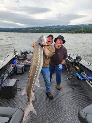 My big Sturgeon catch! The look on the guides face is the best....