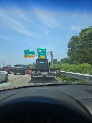 Tow truck rescuing me from the side of the highway with NO breakdown lane. Highly recommend, you won't be disappointed!