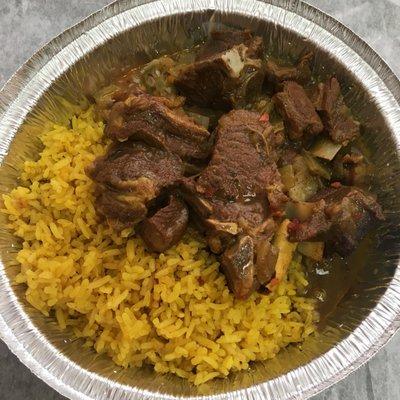 Jollof Rice (I think), okra, and curry goat!