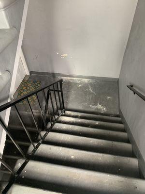 Holes they punctured in the stairwell of our complex.