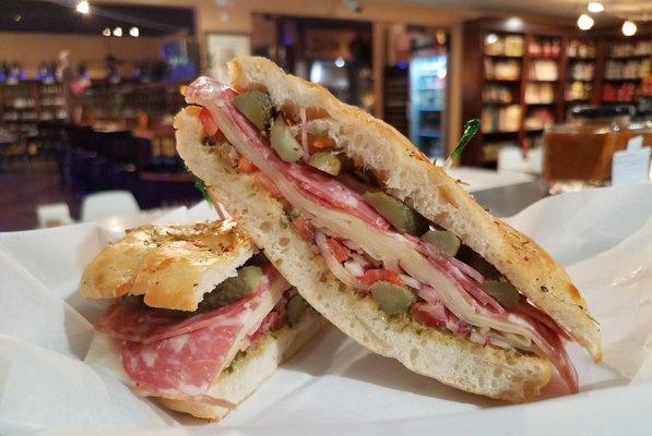 Our " Einstein " : Salami, Provolone, Tomato, Red Onions, Salsa Verde and Cornichons