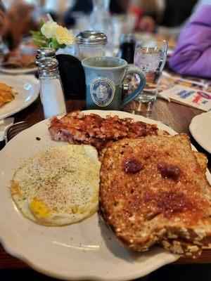 Corned Beef Hash and over medium eggs! Good food