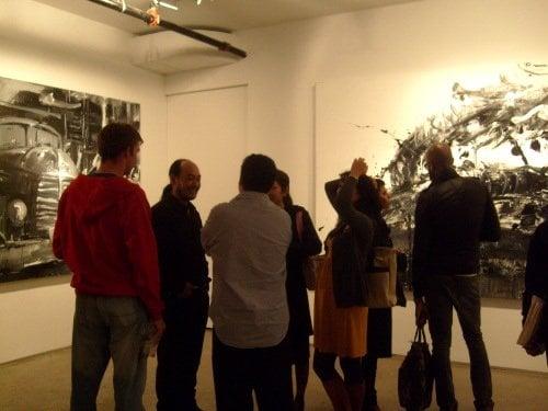 The artist Cui Guotai mingling with patrons at ChinaSquare Gallery