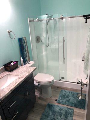 New texture, flooring, vanity, paint, slider door!