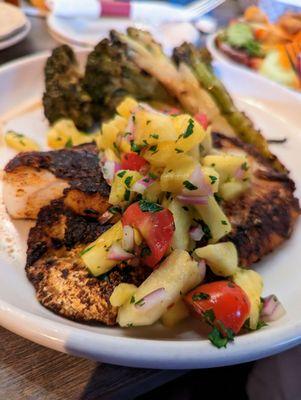 Blacked Haddock. $26.95. Pan-seared haddock filet with mild house blackening seasoning, topped with fresh chopped pineapple cucumber salad.