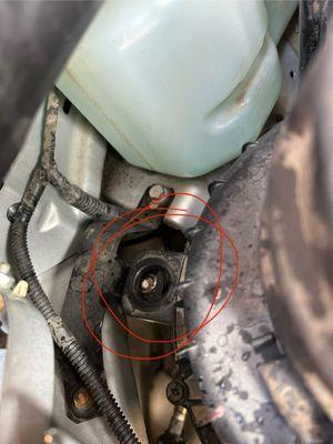 Mounting bolt broken off.