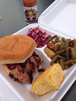 YUM-O! Brisket combo, with red cabbage slaw and spicy green beans - and a bottle of pineapple habanero sauce for the pantry.
