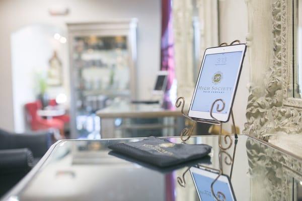 There is an iPad at every booth for clients and stylists to use!