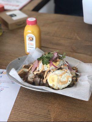 Luchador breakfast Potatoes, carnitas hash, crispy egg, aioli, real sausage
