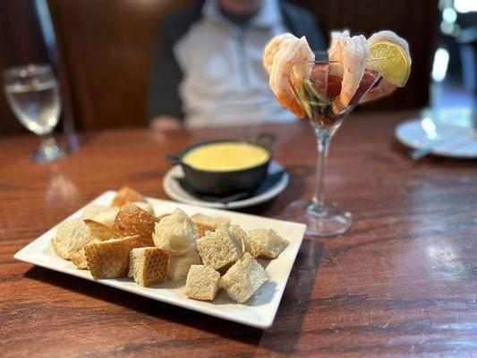 Beer cheese fondue and shrimp cocktail.