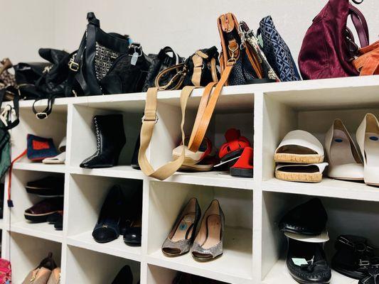 Nice selection of purses, wallets, and shoes