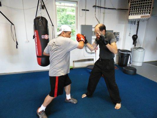 The Director another USA Boxing Masters Boxing Division athlete working with Academy clients.