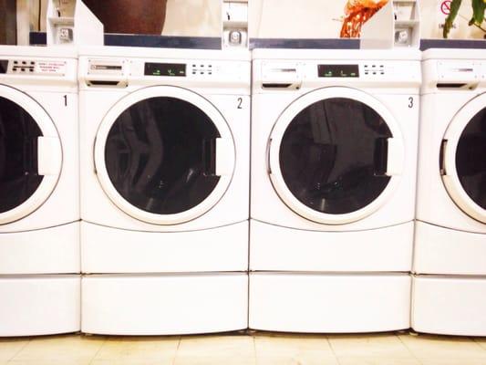 A row of Maytag commercial washers